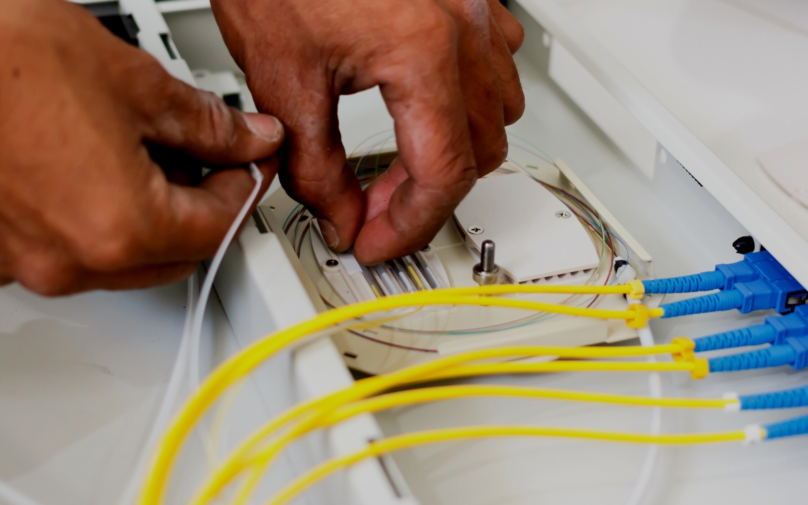 How do I connect a fiber optic cable to Ethernet